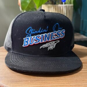 Standin’ on Business Black Trucker Hat